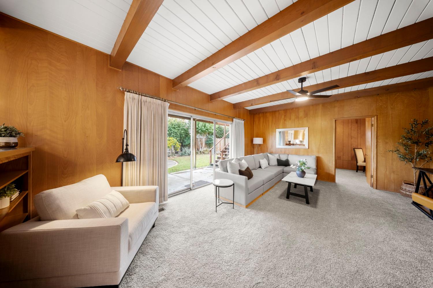 929 Terrace Place Modesto, CA 95350 - Photo 15 of 35 a living room with furniture and a floor to ceiling window