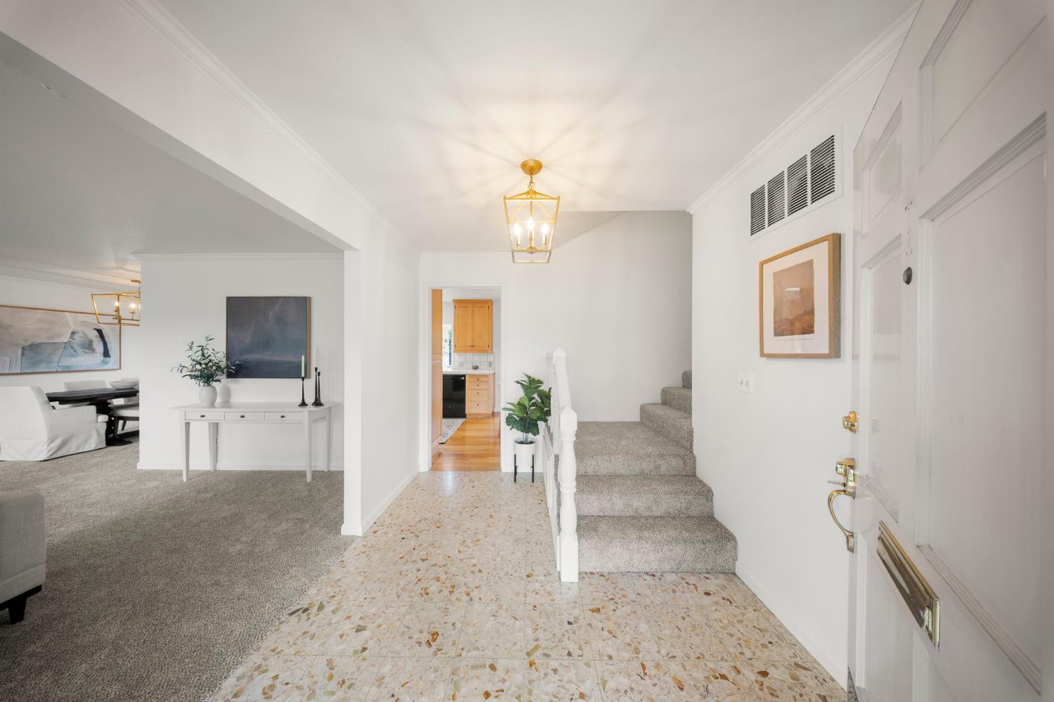 929 Terrace Place Modesto, CA 95350 - Photo 7 of 35 a view of a livingroom with furniture a fireplace and wooden floor