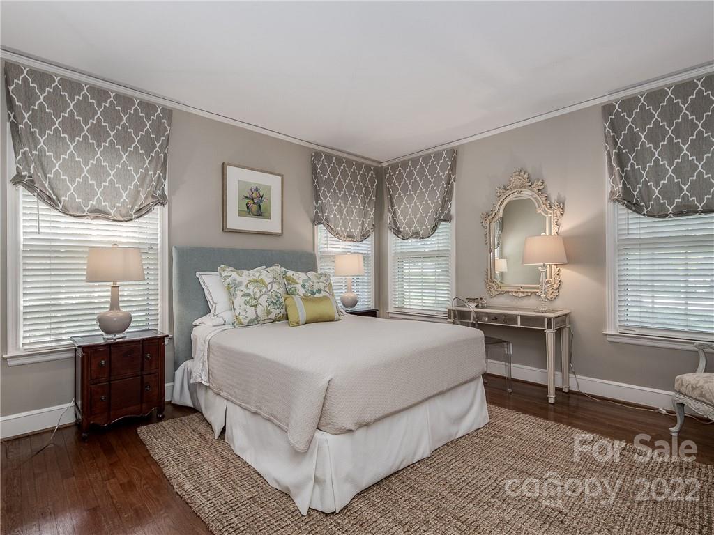 2701 Sharon Road Charlotte, NC 28211 - Photo 17 of 40 a bedroom with a large bed and a window