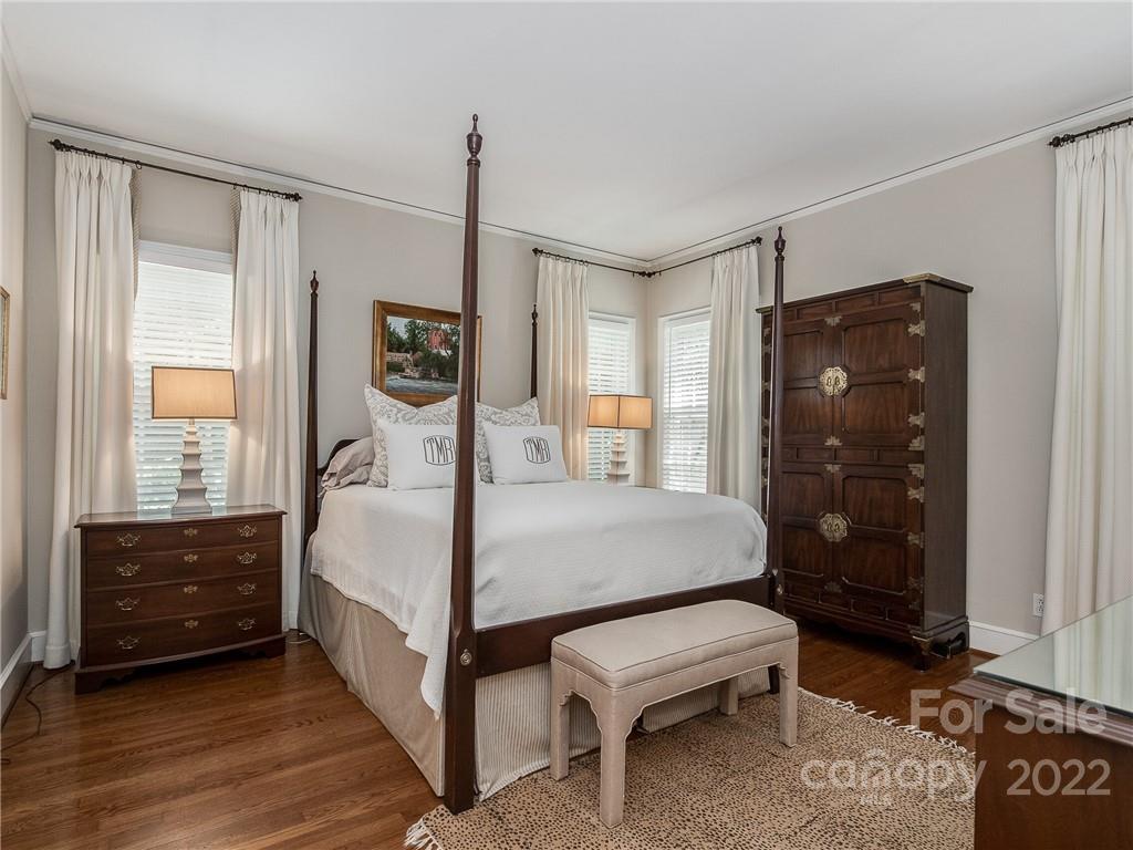 2701 Sharon Road Charlotte, NC 28211 - Photo 19 of 40 a bed room with a bed and a window