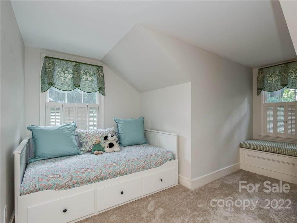2701 Sharon Road Charlotte, NC 28211 - Photo 23 of 40 a living room with furniture and a window