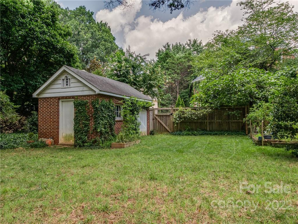 2701 Sharon Road Charlotte, NC 28211 - Photo 34 of 40 a front view of a house with garden