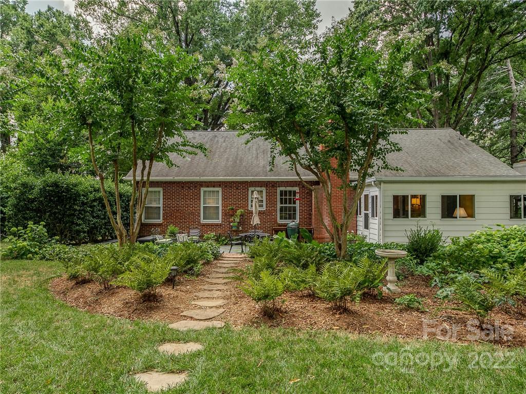 2701 Sharon Road Charlotte, NC 28211 - Photo 36 of 40 a front view of a house with garden