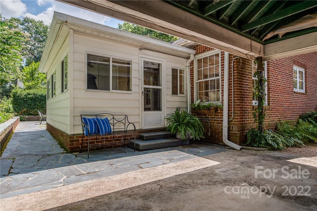 2701 Sharon Road Charlotte, NC 28211 - Photo 37 of 40 a view of a house with backyard and sitting area