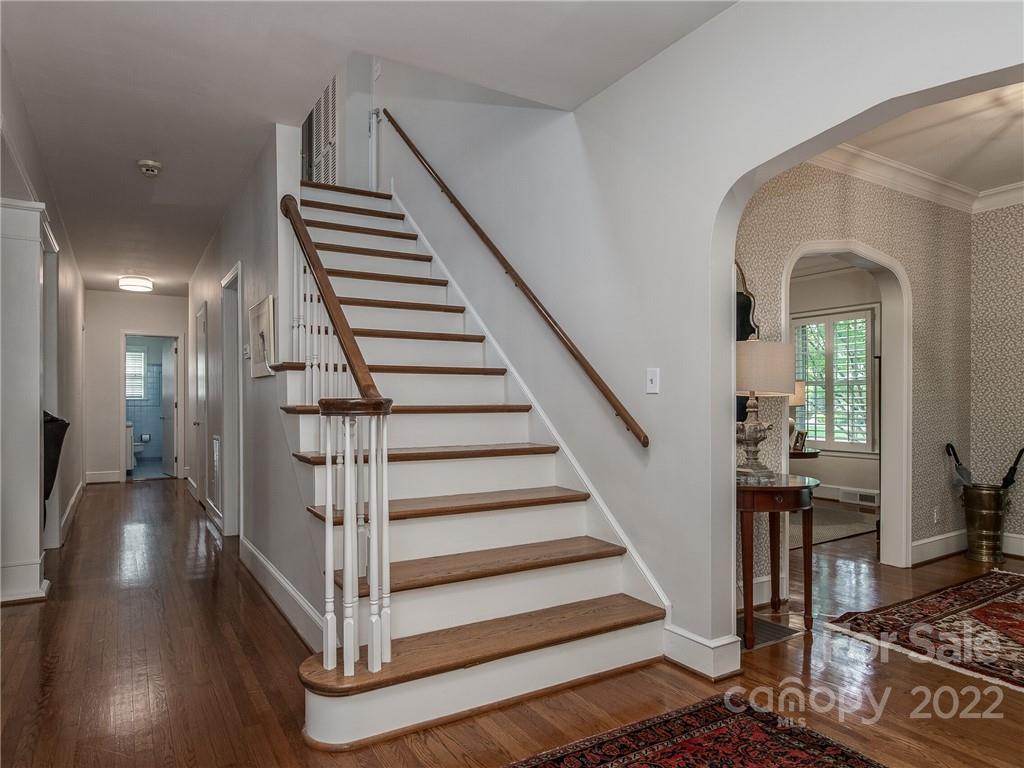 2701 Sharon Road Charlotte, NC 28211 - Photo 5 of 40 a view of entryway and hall with wooden floor