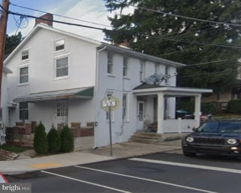 103 Rampike Hill Road Bendersville, PA 17304 - Photo 2 of 22 a view of a white house with a outdoor space