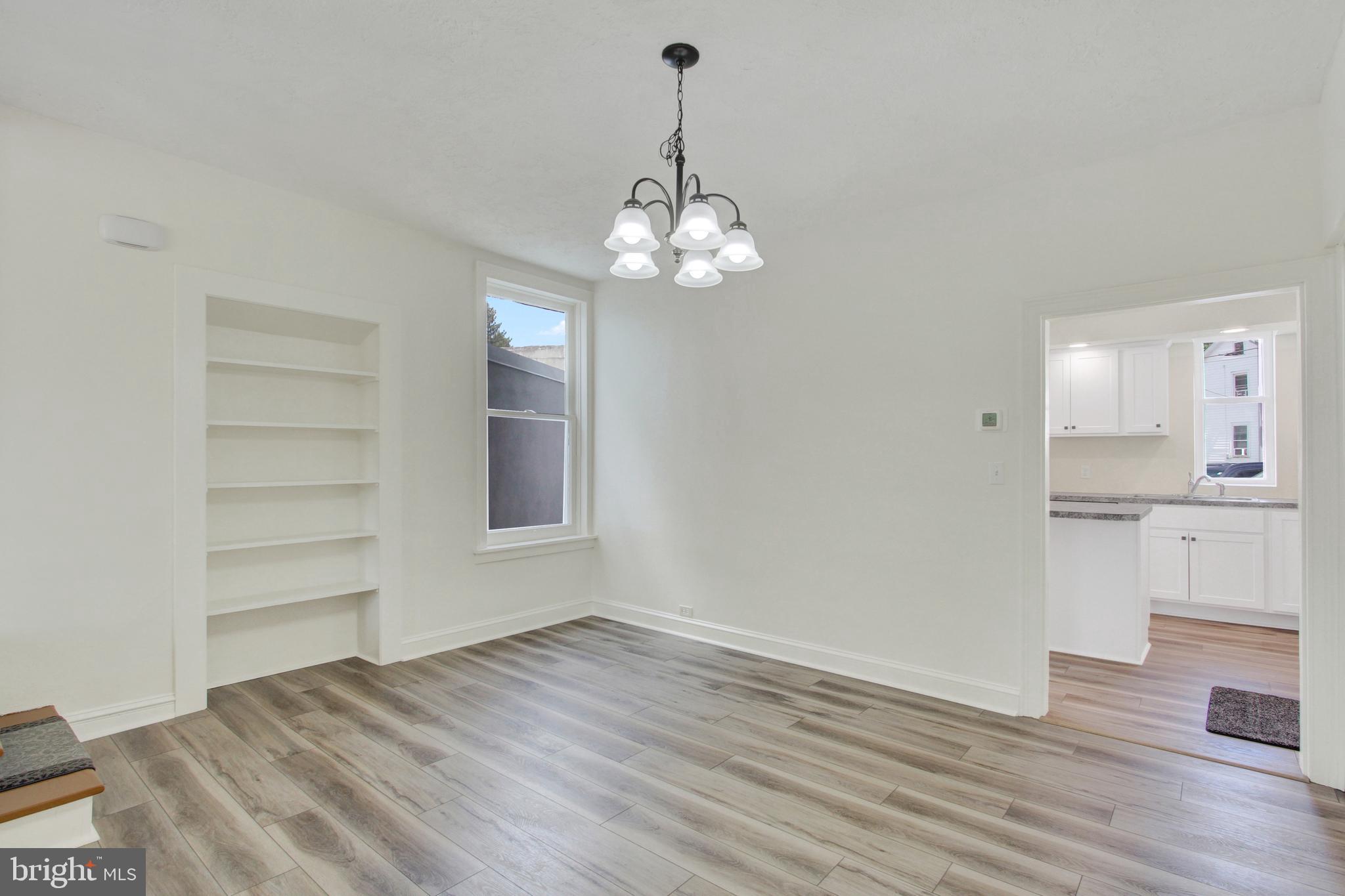 103 Rampike Hill Road Bendersville, PA 17304 - Photo 5 of 22 a view of a room with wooden floor and windows