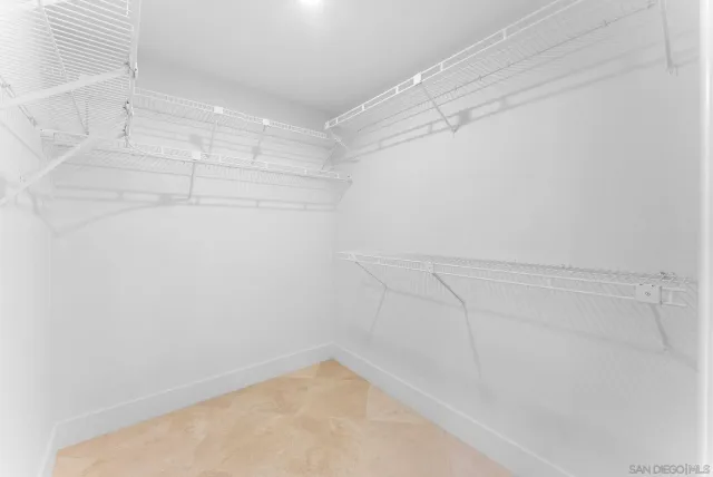 a view of a room with racks on the wall