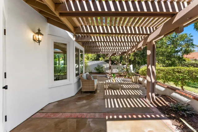 a view of a porch with furniture