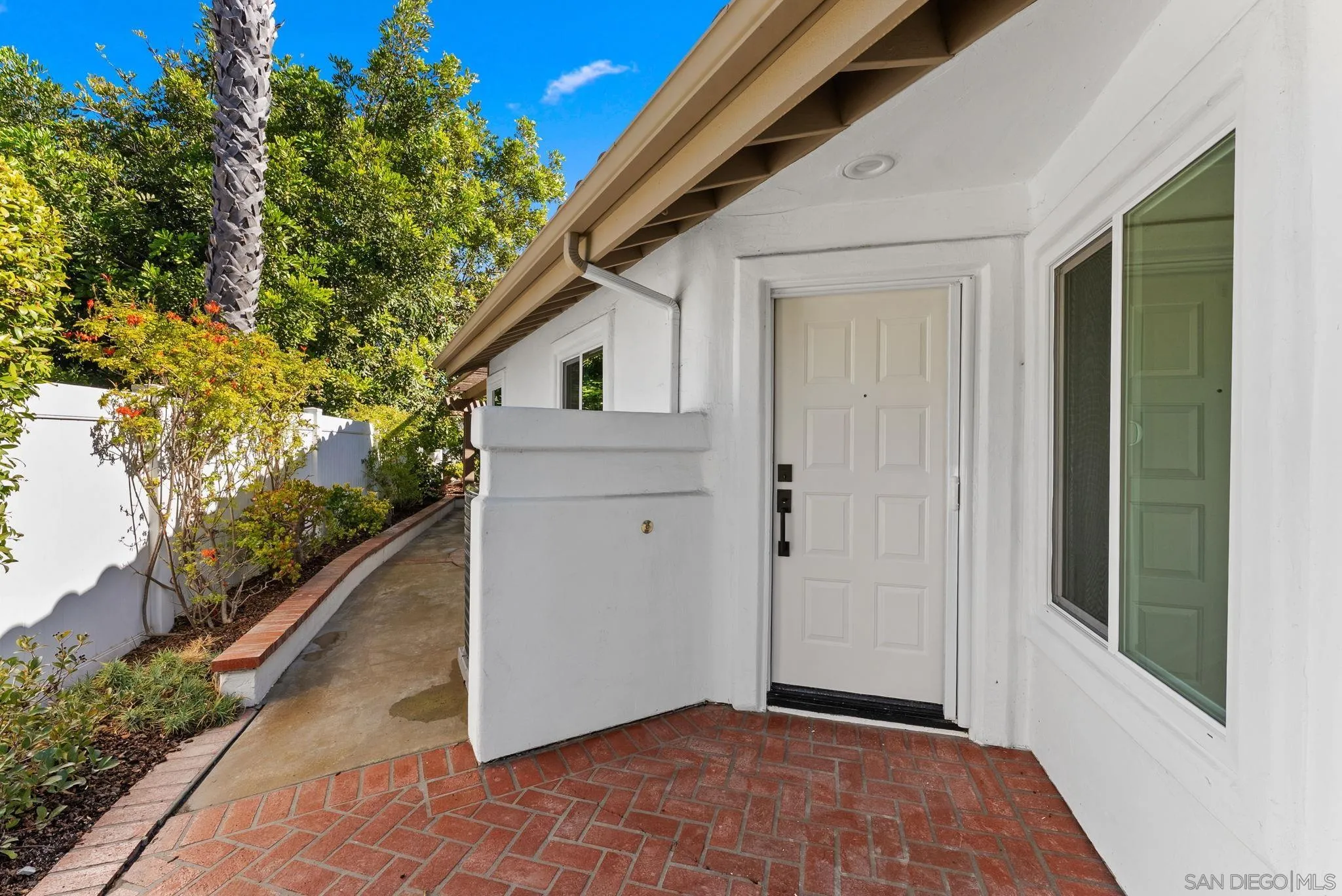4946 Alicante Way Oceanside, CA 92056 - Photo 3 of 34 a view of a house with a backyard