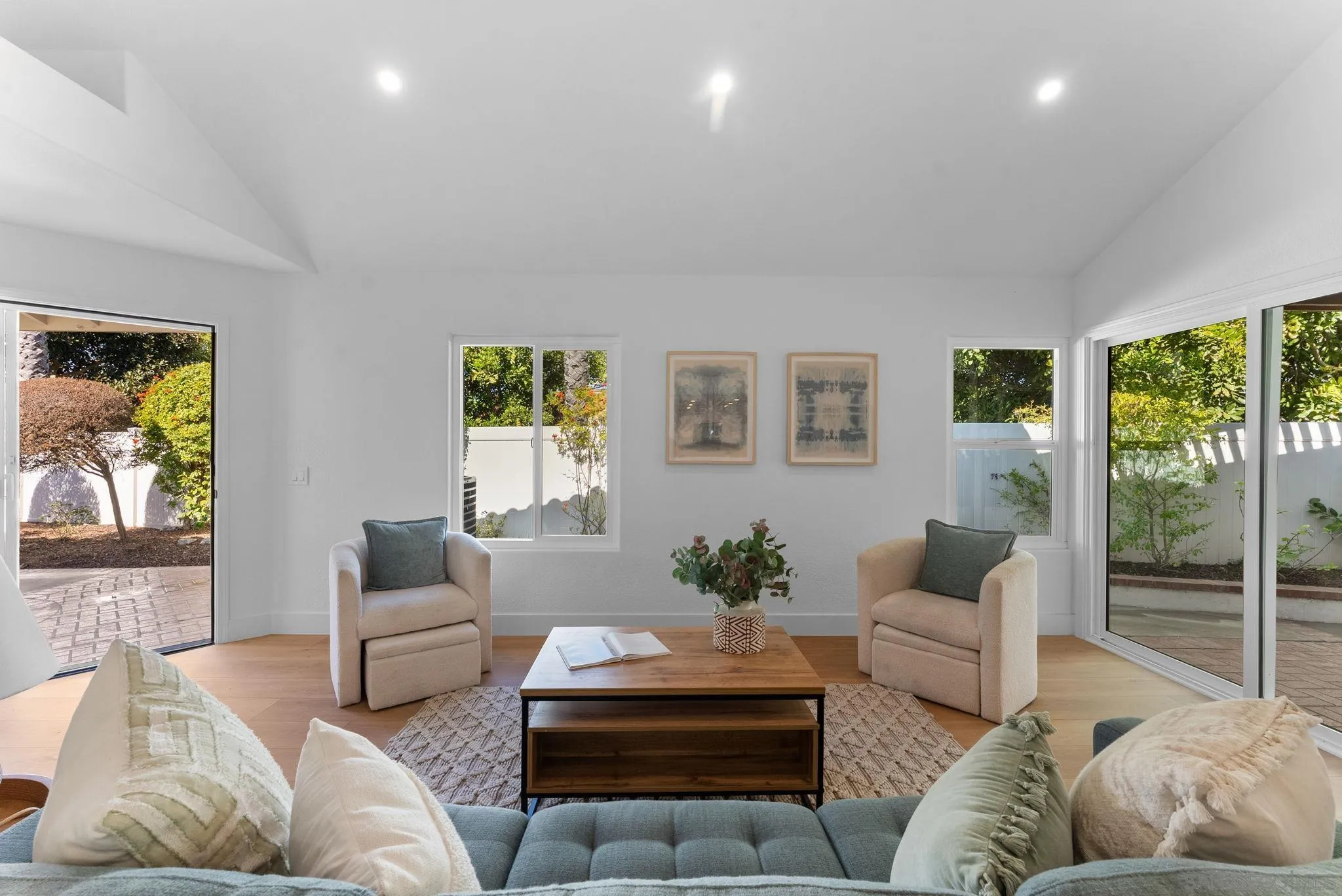 4946 Alicante Way Oceanside, CA 92056 - Photo 6 of 34 a living room with furniture and a large window
