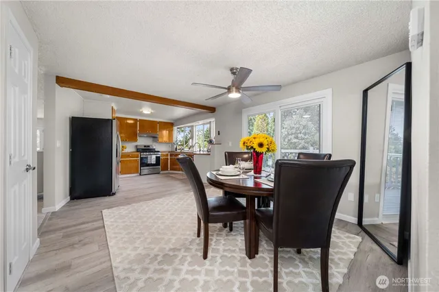 a view of a dining room with furniture