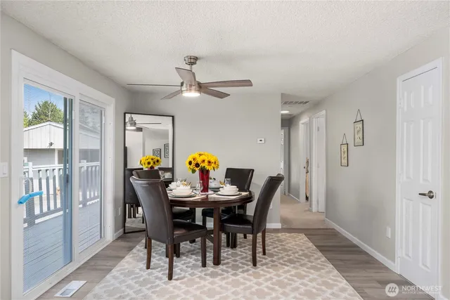 a view of a dining room with furniture
