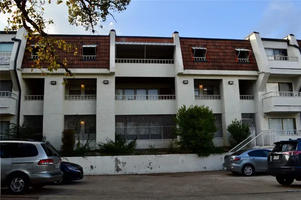 a car parked in front of a house