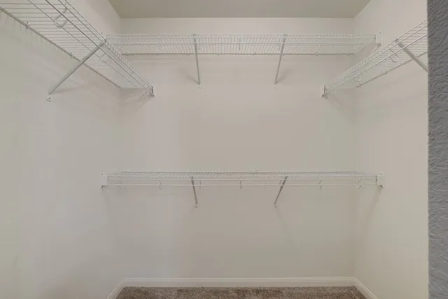 a view of a room with racks on the wall