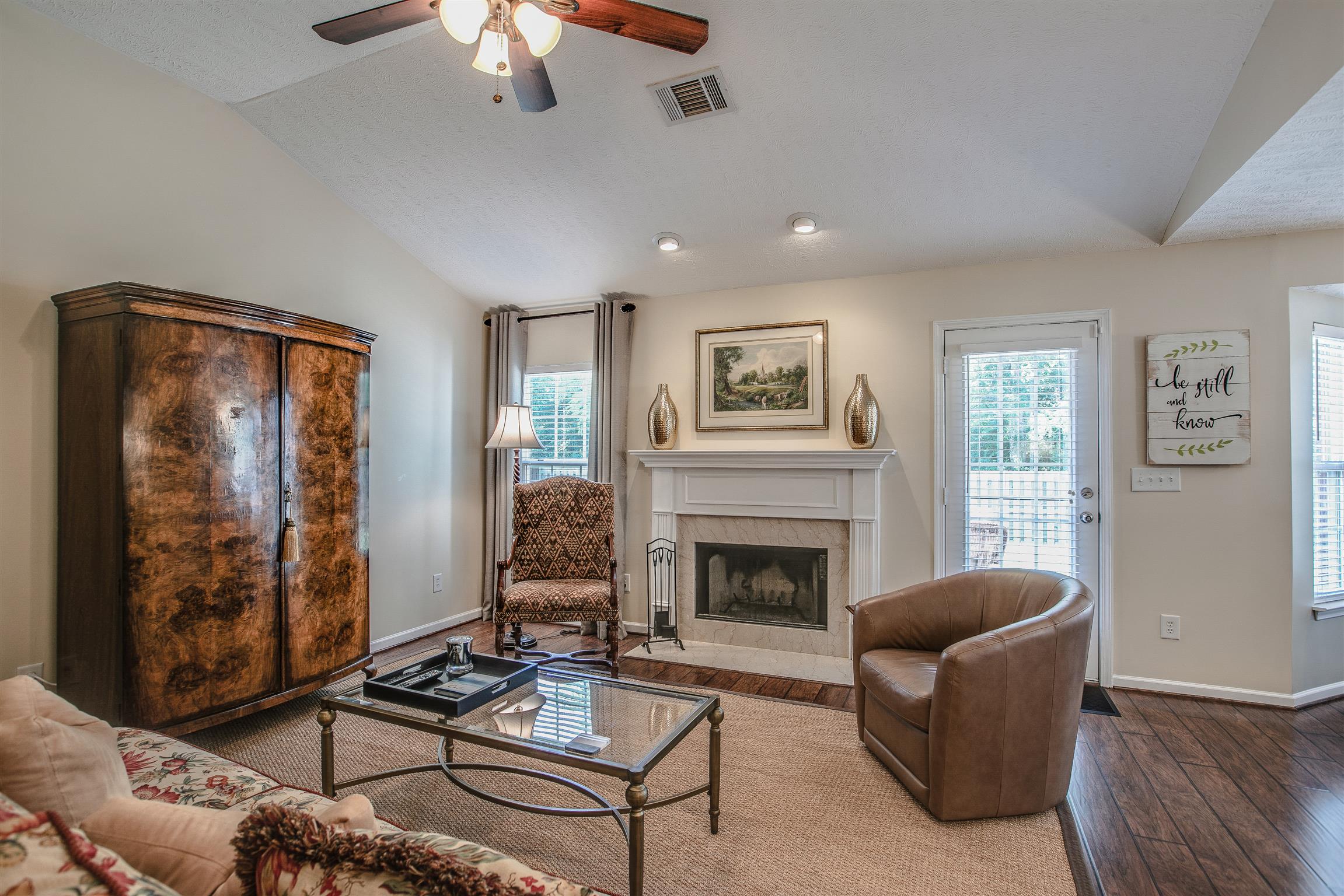 2008 Fiona Way Spring Hill, TN 37174 - Photo 4 of 20 Soaring vaulted ceilings are sure to impress and a wood-burning fireplace will keep you cozy!