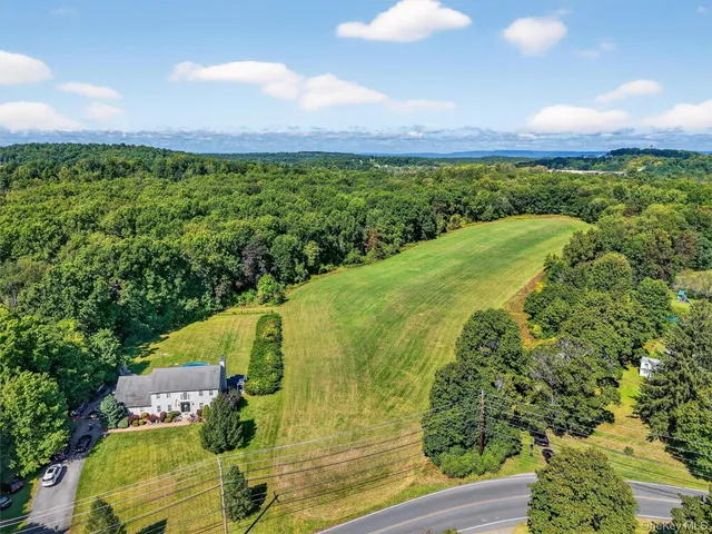a view of a yard with an outdoor space