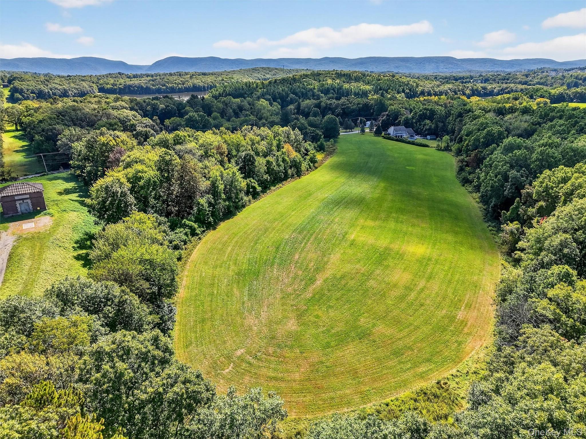 Mt Airy Road New Windsor, NY 12553 - Photo 10 of 23 a view of a swimming pool with a lake view