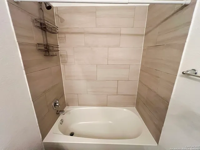 a bathroom with a tub