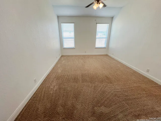 an empty room that has a window