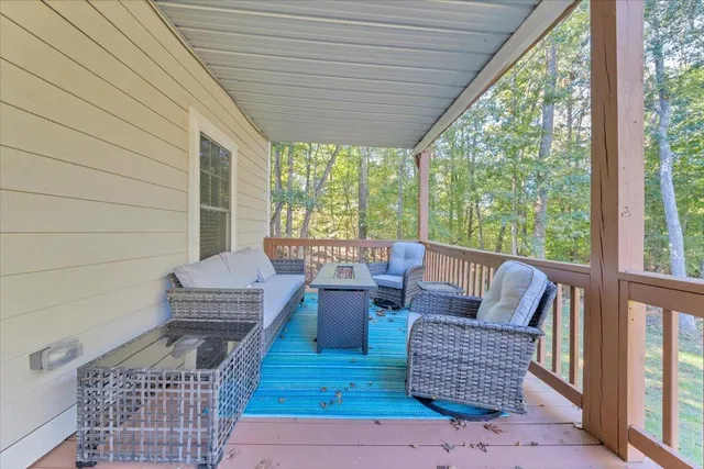 a outdoor living space with furniture and a garden