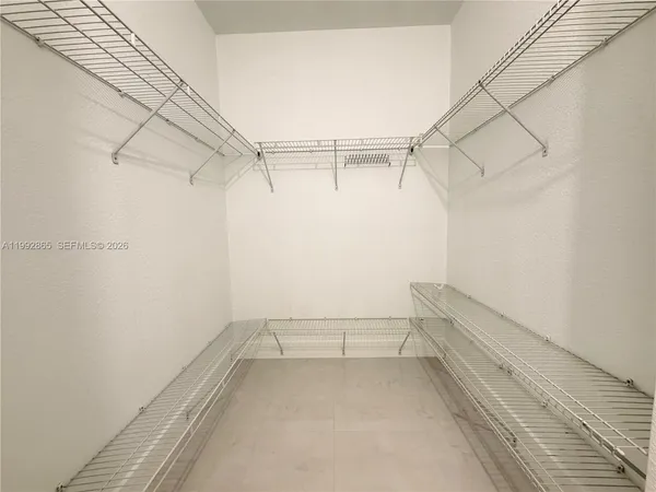 a view of a room with racks on the wall