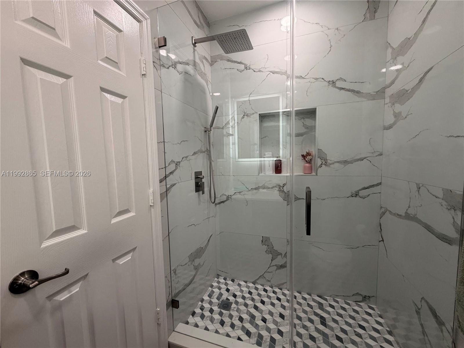14738 Southwest 22nd Terrace Miami, FL 33185 - Photo 19 of 46 a bathroom with a shower