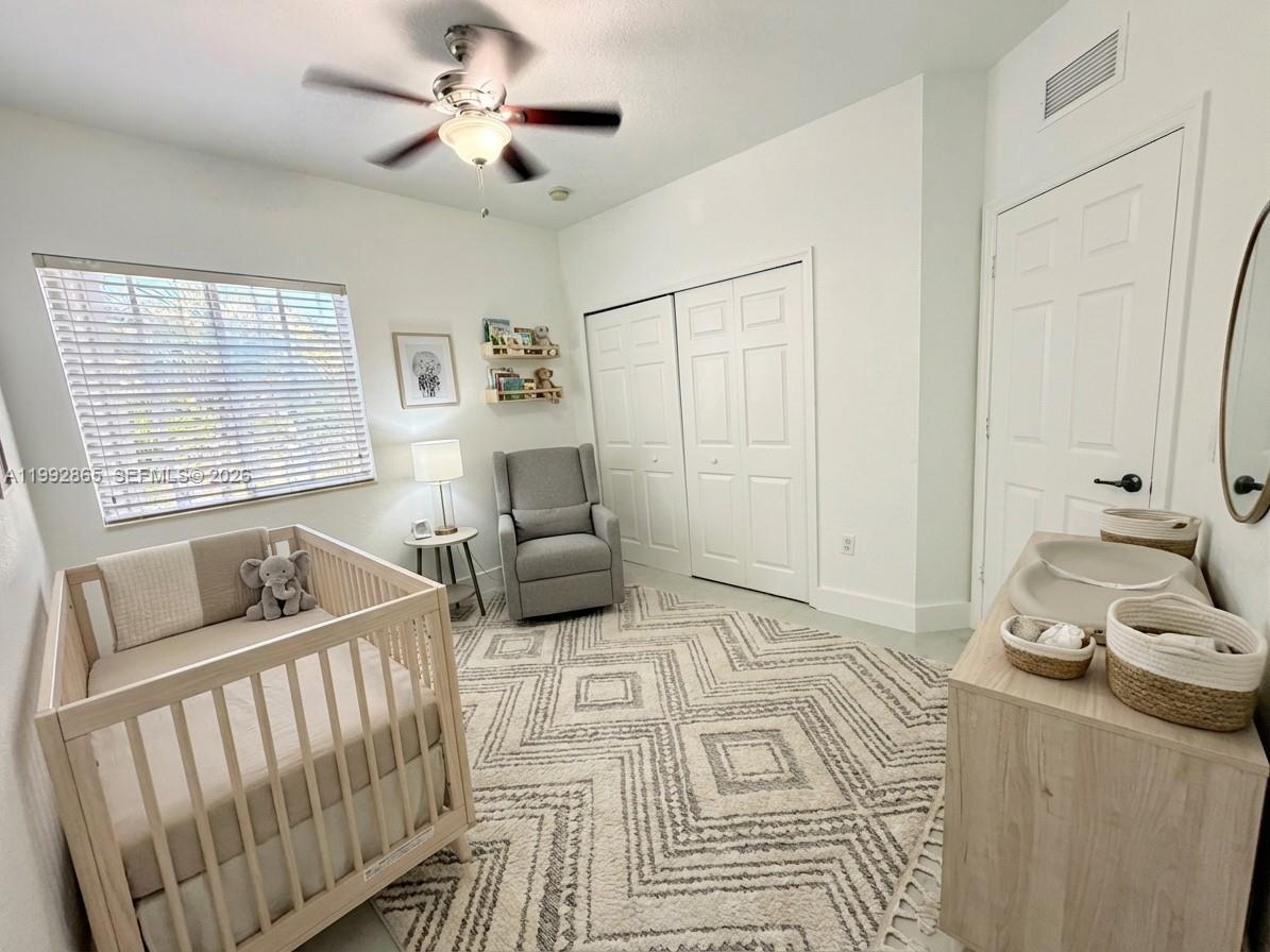 14738 Southwest 22nd Terrace Miami, FL 33185 - Photo 21 of 46 a bedroom with furniture and a window