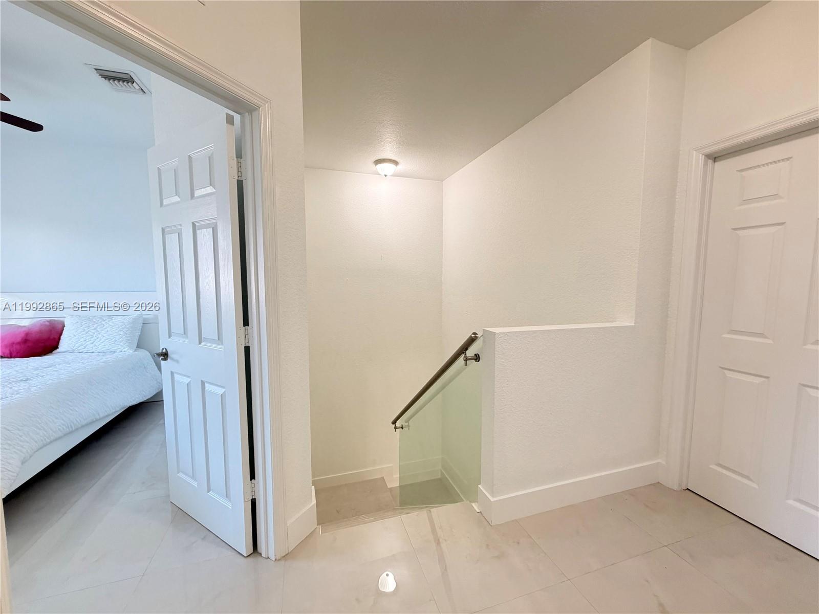 14738 Southwest 22nd Terrace Miami, FL 33185 - Photo 23 of 46 a view of a livingroom with wooden floor and closet