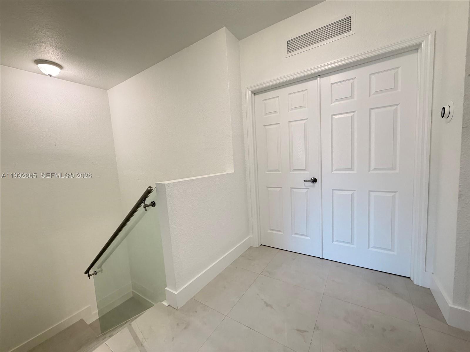 14738 Southwest 22nd Terrace Miami, FL 33185 - Photo 26 of 46 a view of an empty room