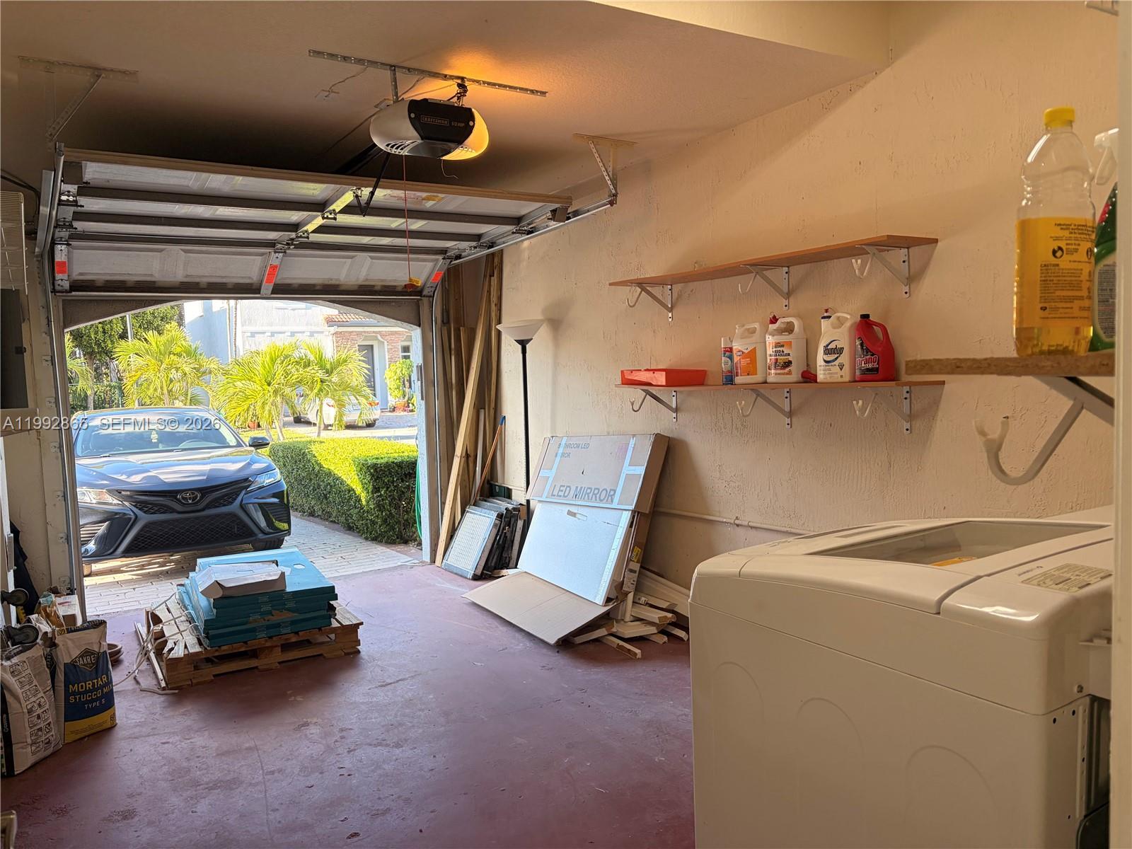 14738 Southwest 22nd Terrace Miami, FL 33185 - Photo 31 of 46 a room with gym equipment and a large window