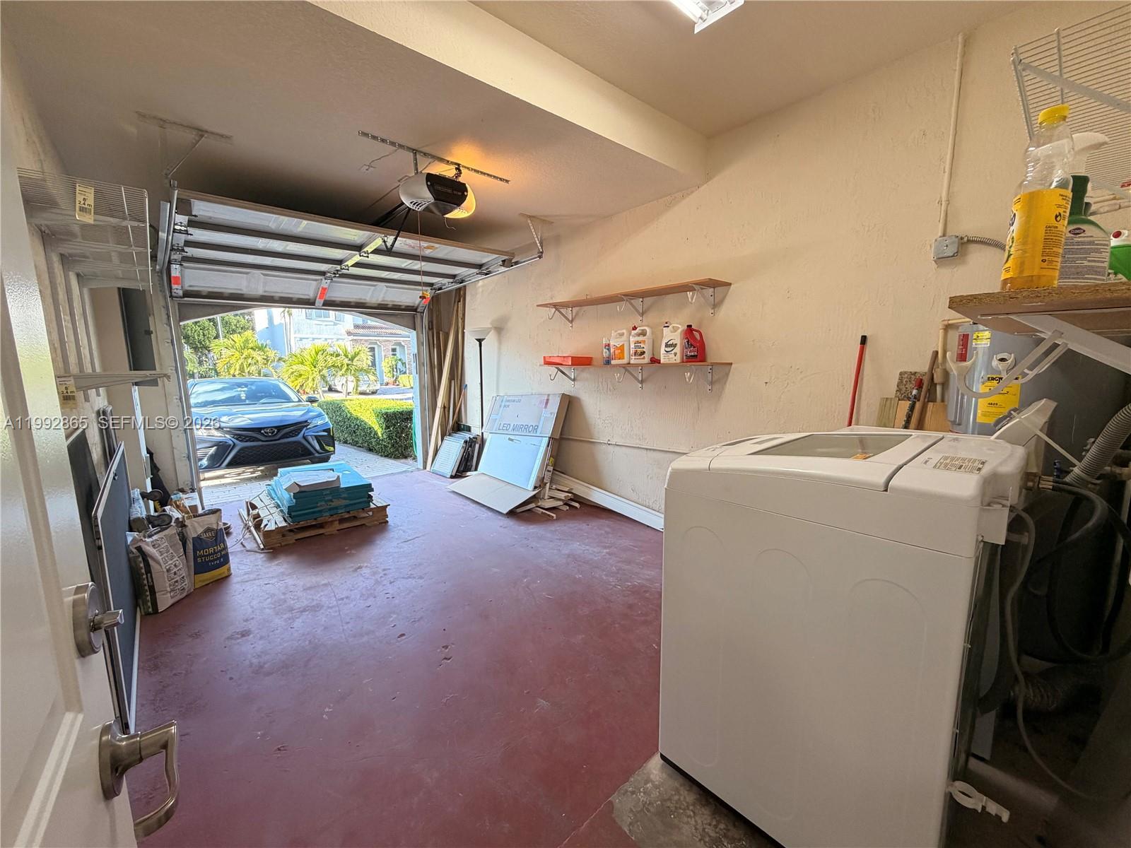 14738 Southwest 22nd Terrace Miami, FL 33185 - Photo 32 of 46 a room with storage and utility