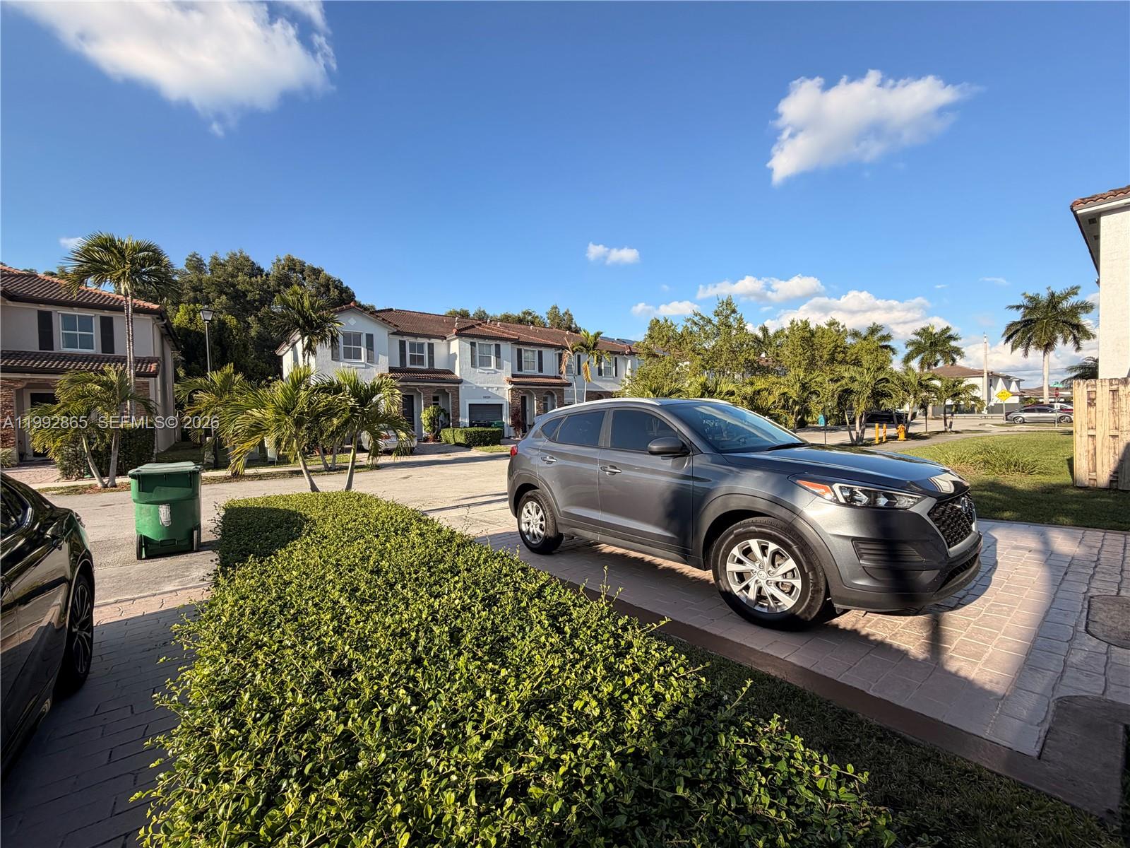 14738 Southwest 22nd Terrace Miami, FL 33185 - Photo 33 of 46 a front view of a house with garden