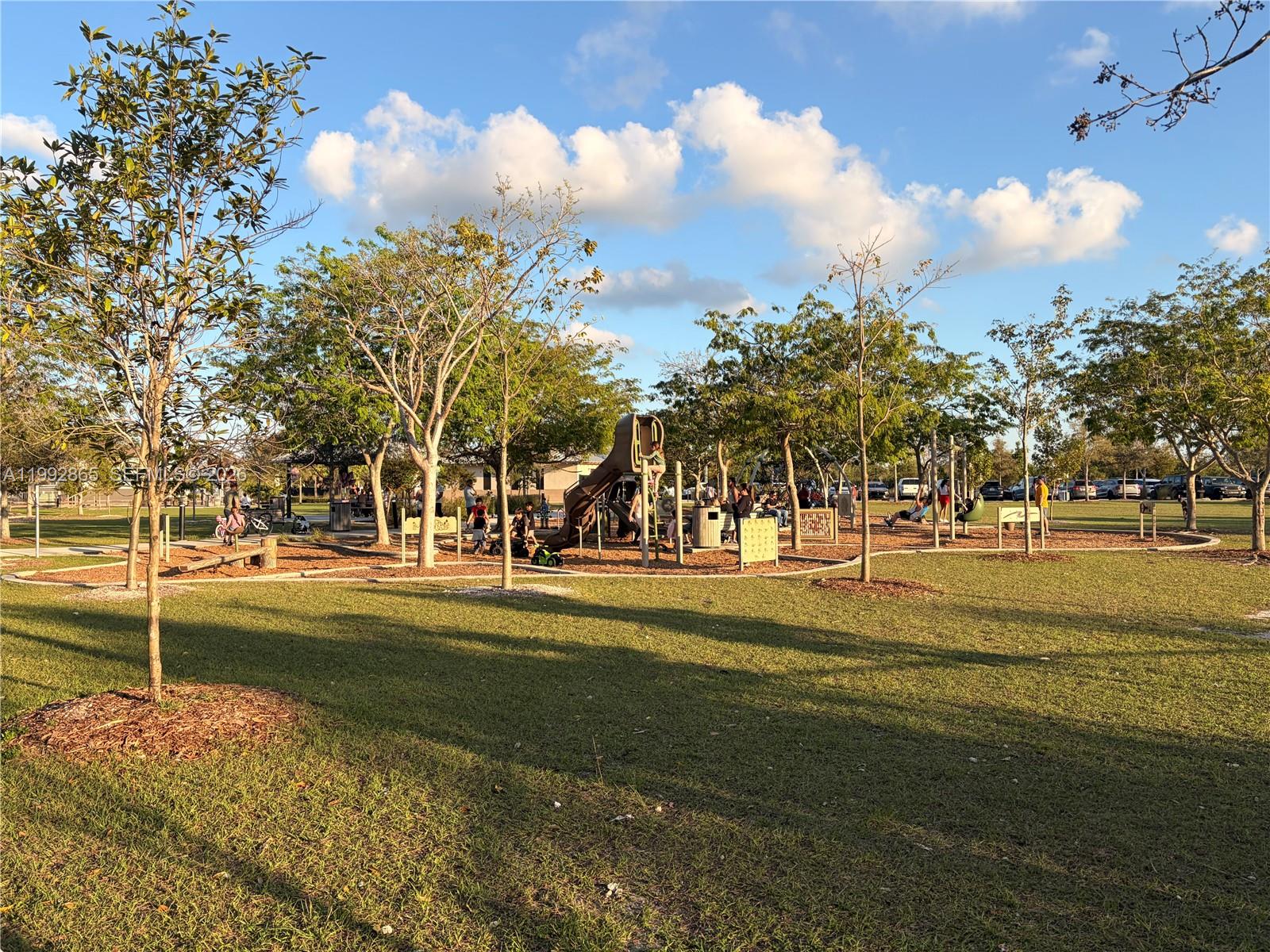 14738 Southwest 22nd Terrace Miami, FL 33185 - Photo 38 of 46 a building with trees in the background