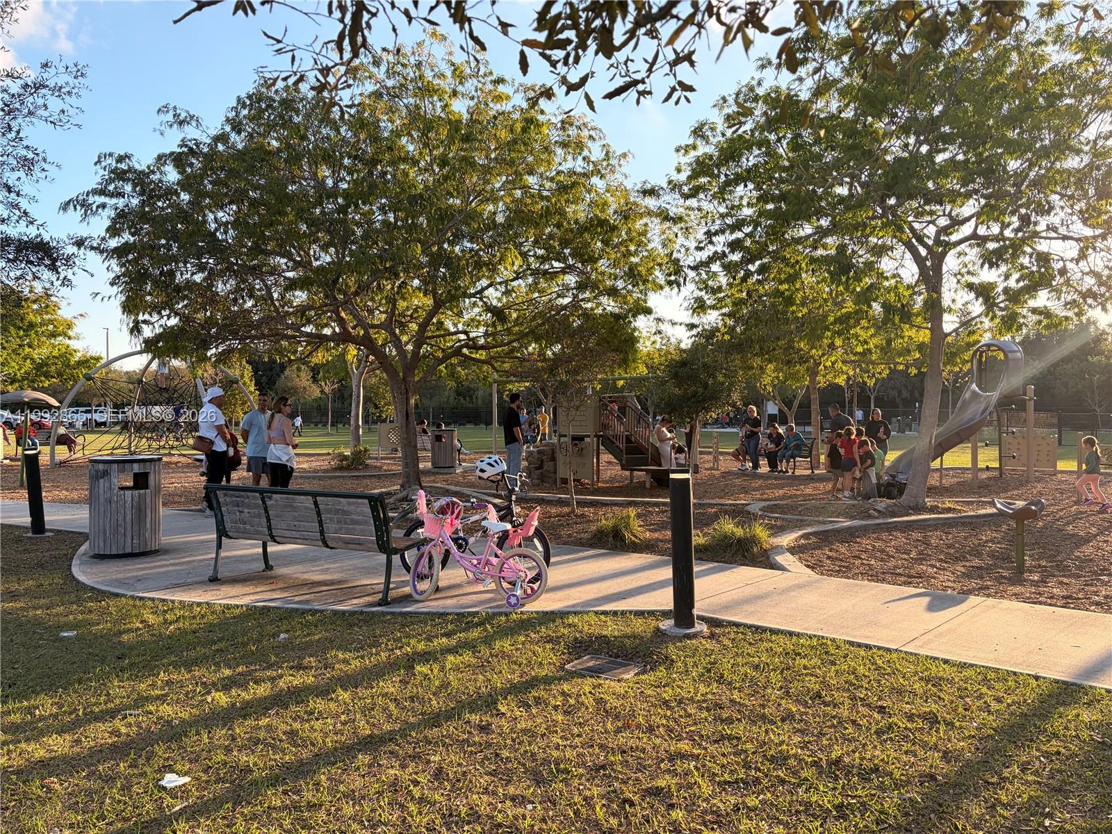 14738 Southwest 22nd Terrace Miami, FL 33185 - Photo 41 of 46 a view of a park with bench