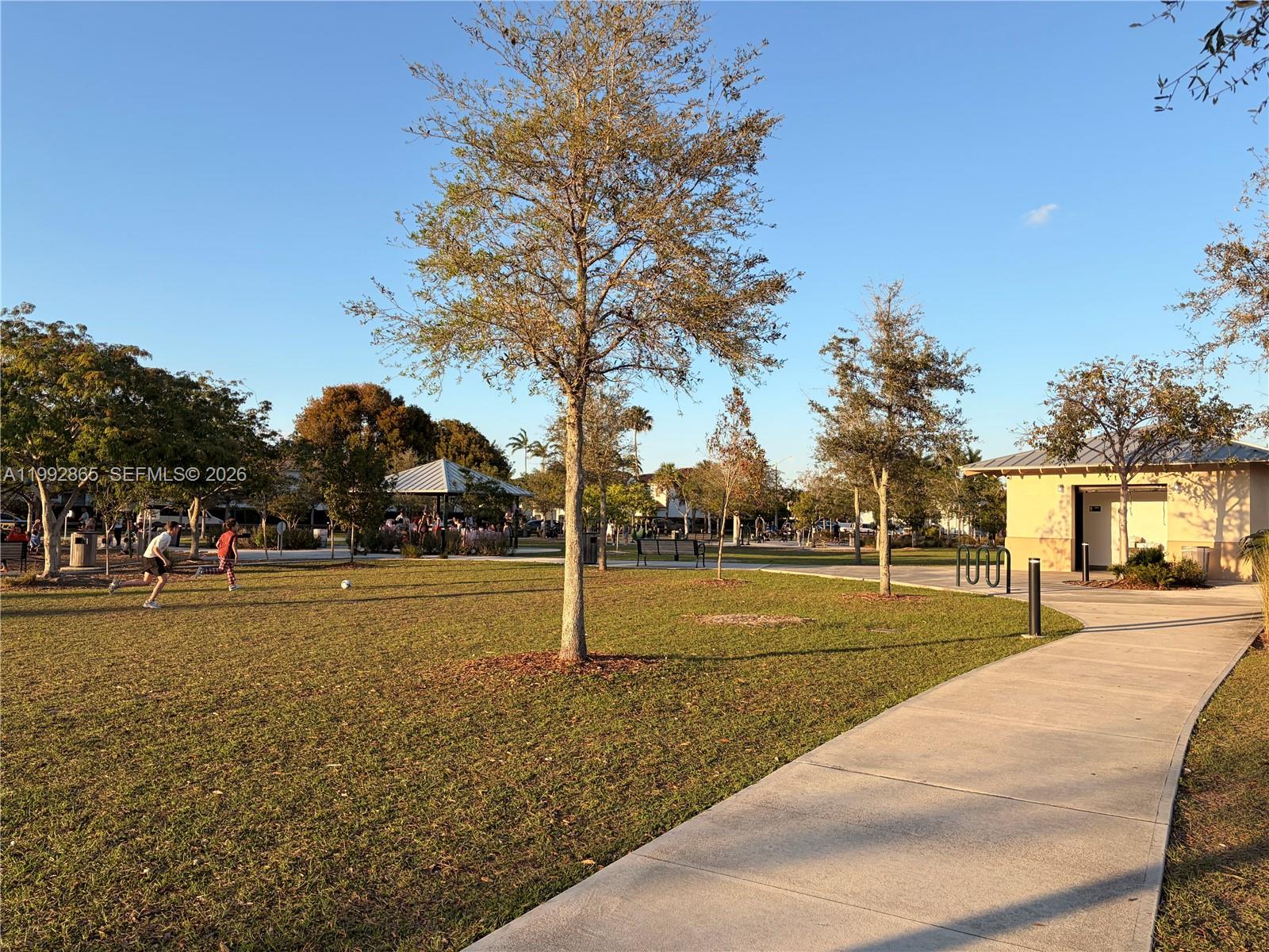 14738 Southwest 22nd Terrace Miami, FL 33185 - Photo 45 of 46 a view of a playground with lots of trees