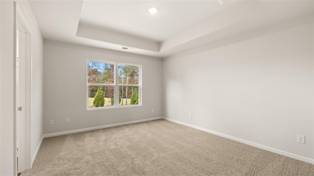 112 Holland Cove Winder, GA 30680 - Photo 14 of 26 an empty room with windows