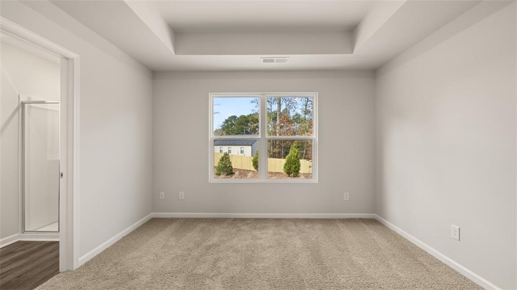 112 Holland Cove Winder, GA 30680 - Photo 15 of 26 a view of an empty room with a window