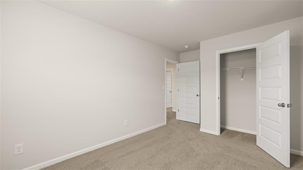 112 Holland Cove Winder, GA 30680 - Photo 21 of 26 a view of an empty room