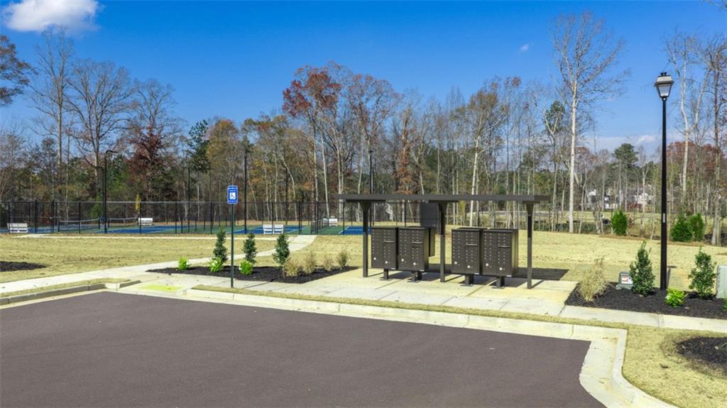 112 Holland Cove Winder, GA 30680 - Photo 26 of 26 a view of a house with a backyard and a area