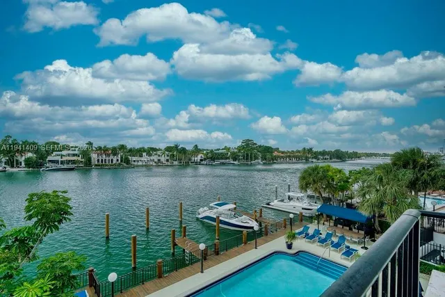 a view of a city with lawn chairs and a big yard