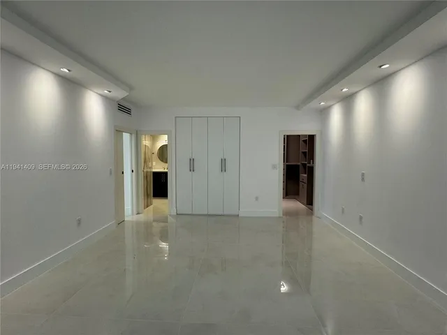 a view of a city with tall buildings