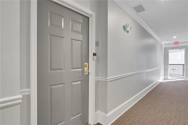 a view of an entryway with hallway