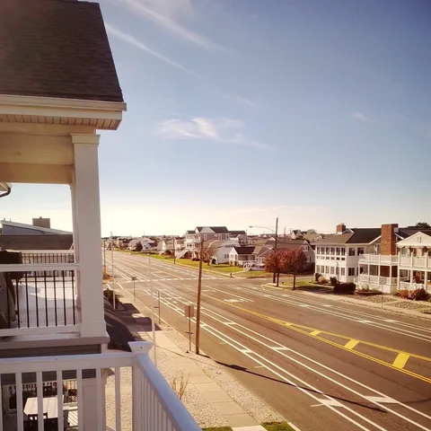 a view of a city street from a balcony