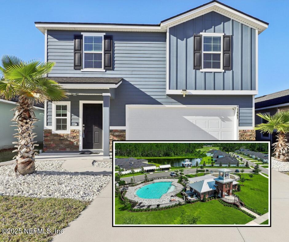 a front view of a house with a yard and outdoor seating