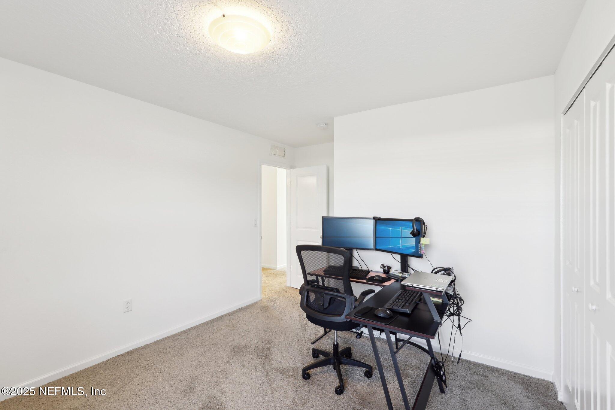 11461 Nathaniel Gorham Way Jacksonville, FL 32221 - Photo 23 of 42 a view of a workspace with furniture