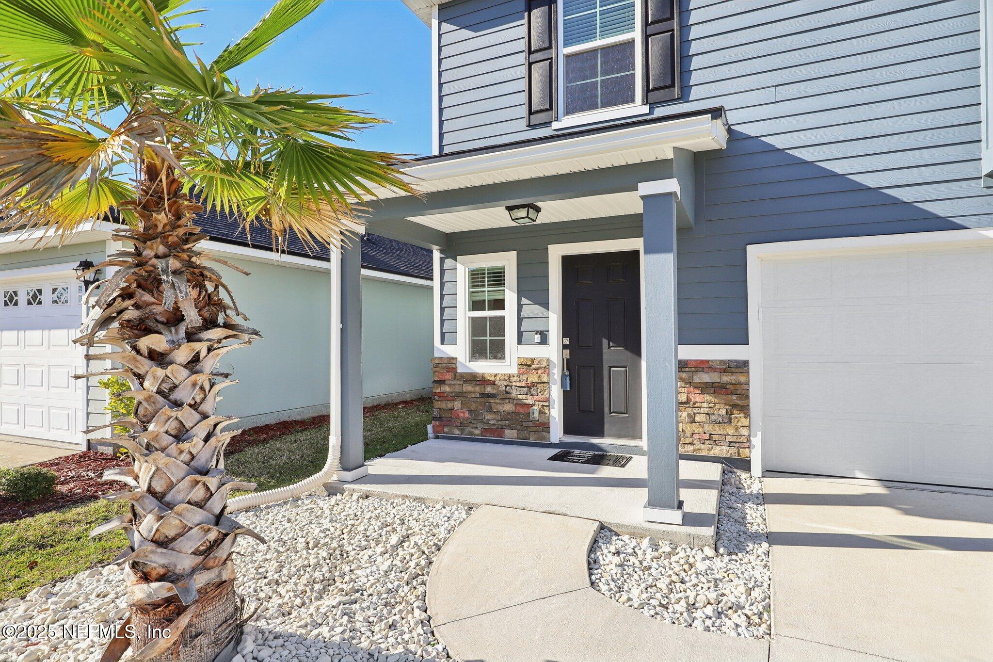 11461 Nathaniel Gorham Way Jacksonville, FL 32221 - Photo 4 of 42 a front view of a house