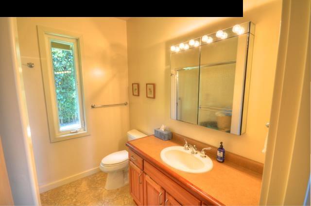 1629 West Kuiaha Road Haiku, HI 96708 - Photo 18 of 29 a bathroom with a sink and a mirror