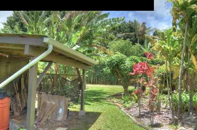 1629 West Kuiaha Road Haiku, HI 96708 - Photo 28 of 29 a backyard of a house with lots of green space