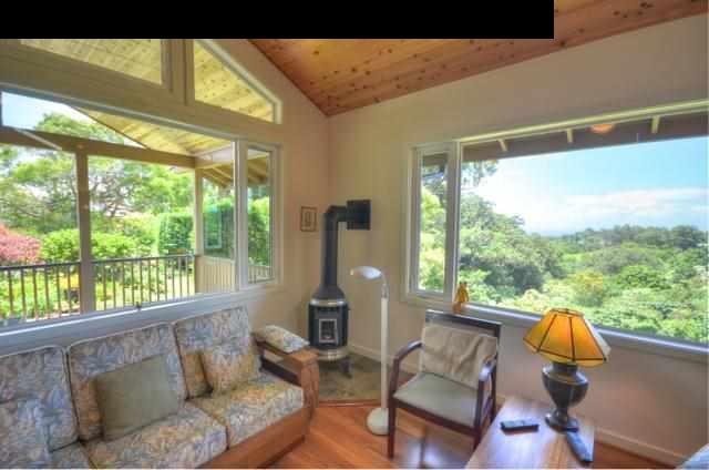 1629 West Kuiaha Road Haiku, HI 96708 - Photo 8 of 29 a living room with furniture and a window